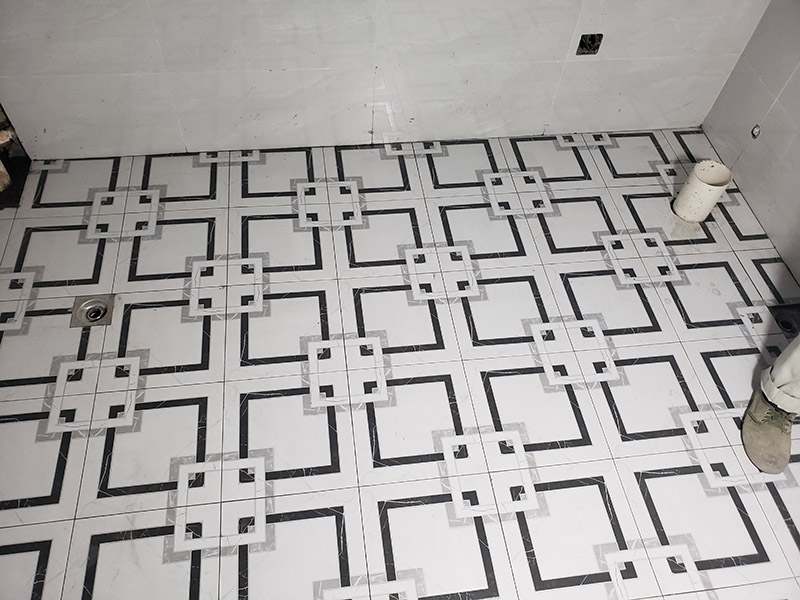 廚衛(wèi)地磚鋪貼：干鋪法是將沙子和水泥按照3：1的比例混合后兌少量的水，使水泥和沙子混合到可以用手攥成團(tuán)的黏稠度。將混合好的沙子水泥鋪在地面上，用一個平板把表面摸平。在瓷磚背面抹上黏稠度非常高的水泥，把瓷磚放到地面上，用橡皮錘敲實就完成了,主要用于地面瓷磚的鋪裝。