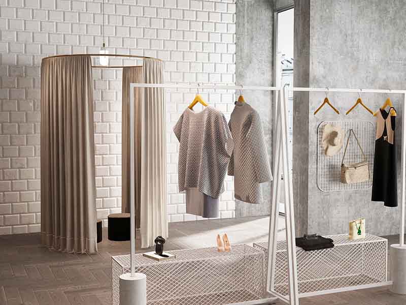 簡單時(shí)尚的小型衣服店鋪裝修，要注重空